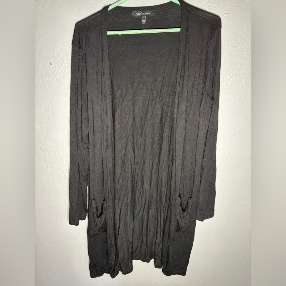 YMI women’s cardigan duster style sweater.‎ Rayon/spandex. SZ. L. Black pockets.